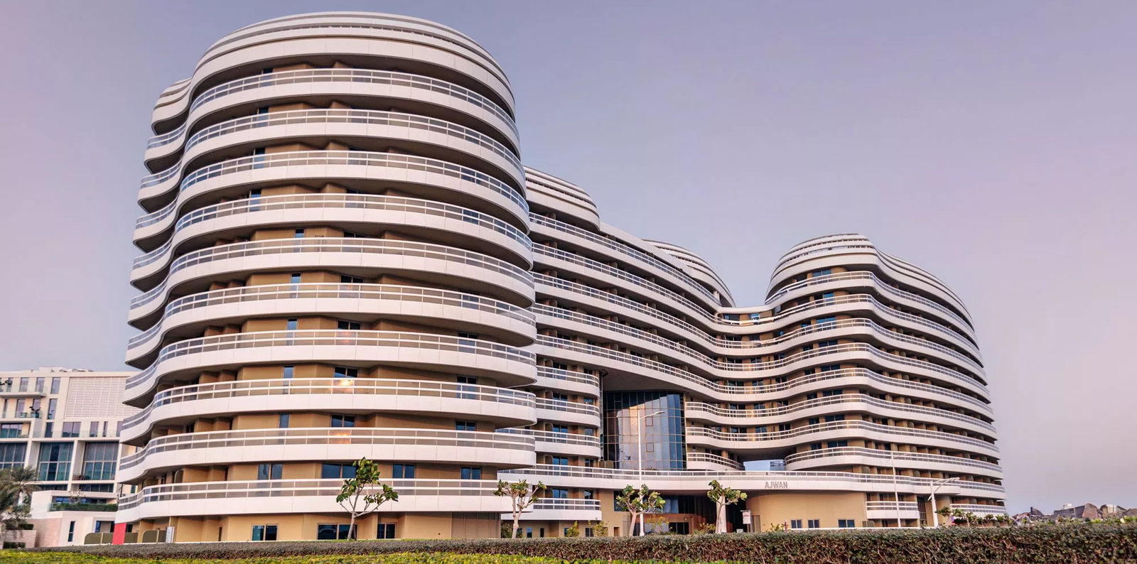 Architecture at its finest—the stunning exterior and manicured grounds of Ajwan Towers.